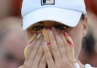 AFP PHOTO / ANDREW YATES