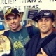 Faber mostra costela quebrada pelo novo campe&atilde;o Bar&atilde;o e posa com rival no aeroporto