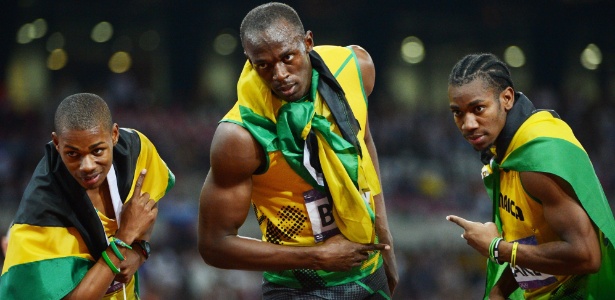 Warren Weir (e.), Usain Bolt (c.) e Yohan Blake (d.), vencedores do revezamento 4 x 100 m