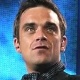 Novo disco de Robbie Williams é o milésimo número um das paradas britânicas - Reprodução