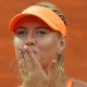 Sharapova abre o jogo sobre namoro com Dimitrov: "sinto-me mais jovem com ele" - AFP PHOTO / ANDREAS SOLARO