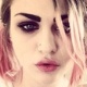 Filha de Kurt Cobain chama de irmã de Kim Kardashian de idiota - Reprodução/Twitter e Getty Images