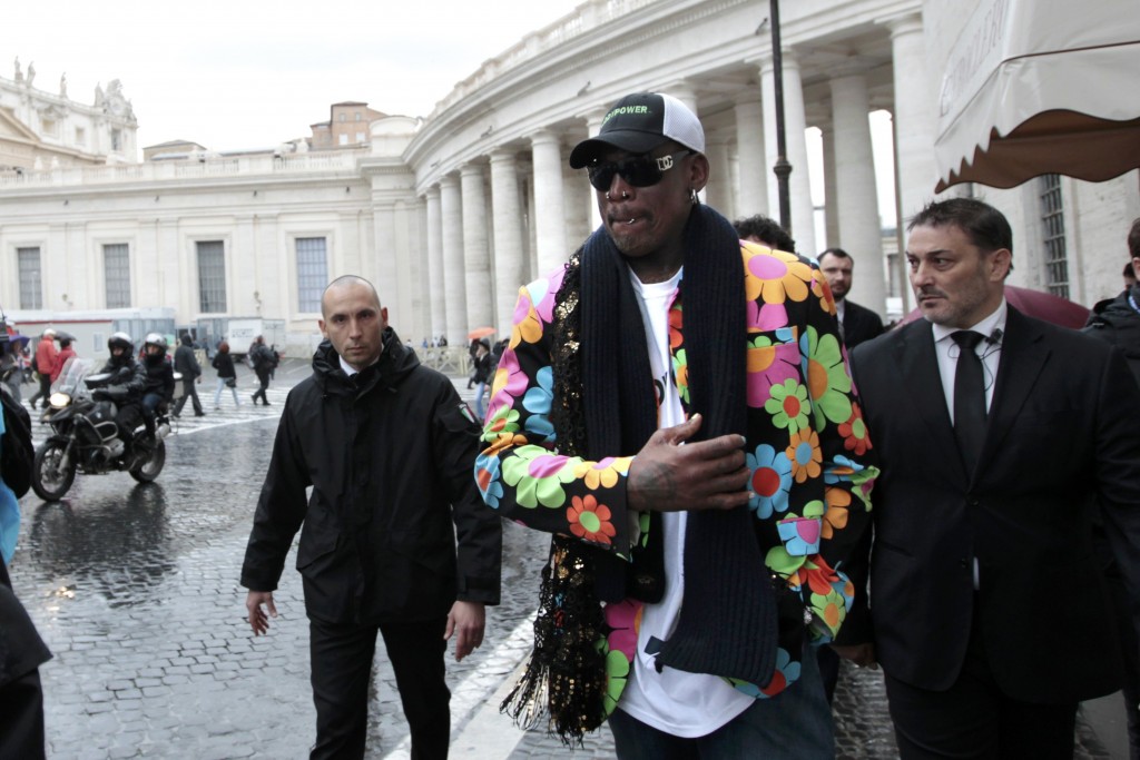 Former basketball star Dennis Rodman, a five-times NBA champion, walks outside Saint Peter's Square at the Vatican