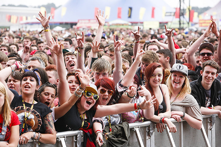 Fans enjoy the atmosphere as Angels And Airwaves perform