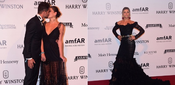 Cauã Reymond e Mariana Goldfarb se beijam ao chegar no baile da amfAR, festa que também teve a presença de Grazi Massafera