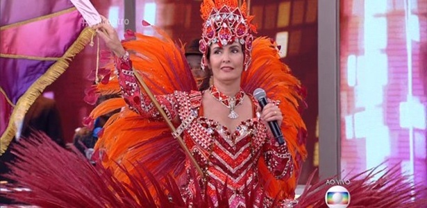 Fátima Bernardes apresenta o programa vestida de porta-bandeira