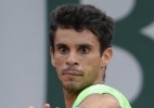Rogerinho leva virada na primeira na grama do ano  (Foto: AFP PHOTO / MARTIN BUREAU)