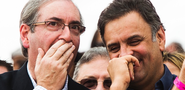 1.mai.2015 - O presidente da Câmara, Eduardo Cunha (PMDB-RJ), com o senador Aécio Neves (PSDB-MG), em palanque da Força Sindical no Dia do Trabalho