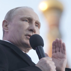 O presidente russo, Vladimir Putin, discursa durante evento em Moscou para marcar o aniversário de um ano da anexação da Crimeia